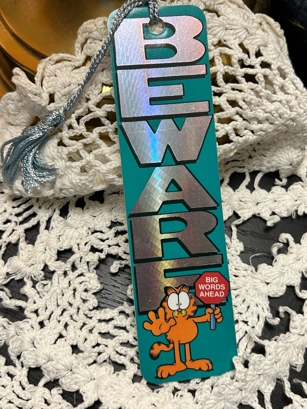 Teal 'Beware' Holographic Bookmark by Jim Davis
